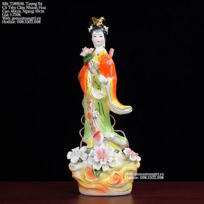 TƯỢNG SỨ CÔ TIÊN CẦM NHÀNH HOA